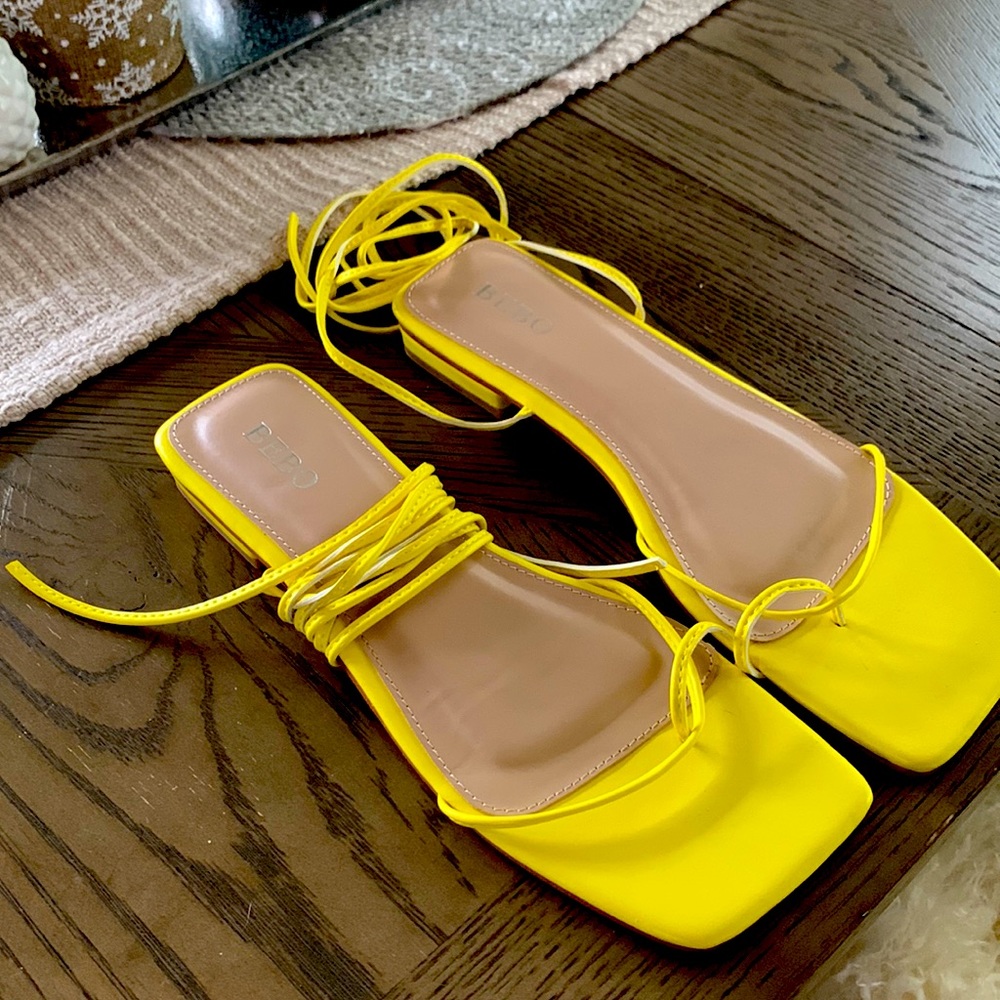 ASOS bebo yellow flat sandals.
